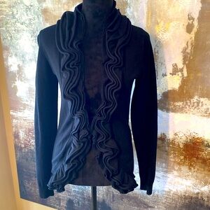 Black sweater with ruffle detail